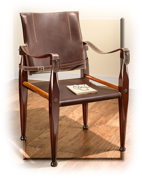 Collsible British Leather Campaign chair with hardwood maple frame. Old World style furniture