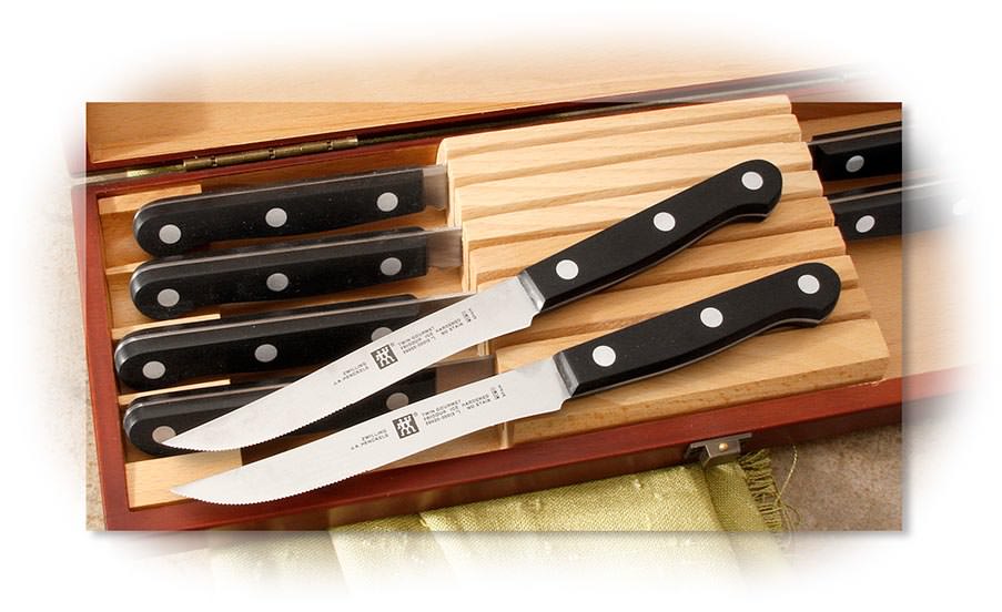 HENCKELS - EIGHT PIECE GOURMET STEAK KNIFE SET WITH WOOD HANDLES AND WOOD PRESENTATION BOX